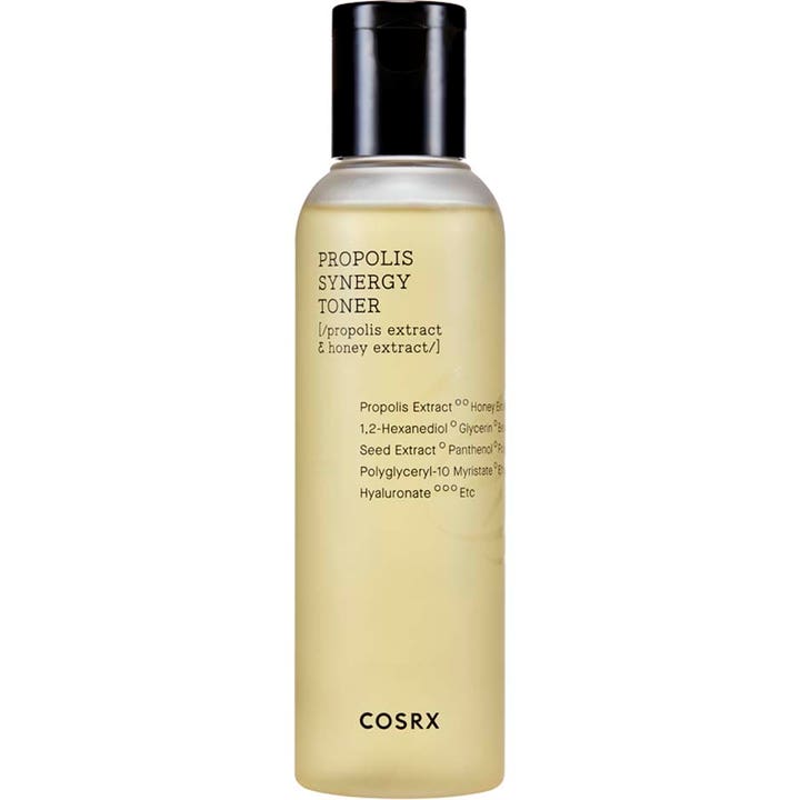 COSRX Propolis Synergy Toner 150ml beroligende ansigtstoner i klar plastflaske med sort låg og gylden væske