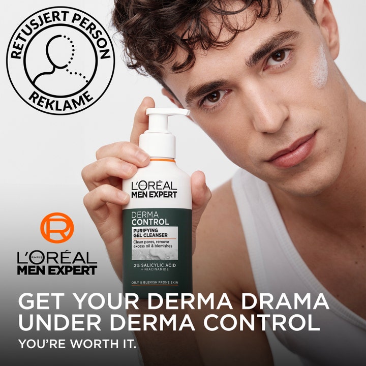 L'Oréal Paris Men Expert Derma Control Purifying Gel Cleanser 260 ml med salicylsyre i hvid pumpeflaske holdt af en mand.