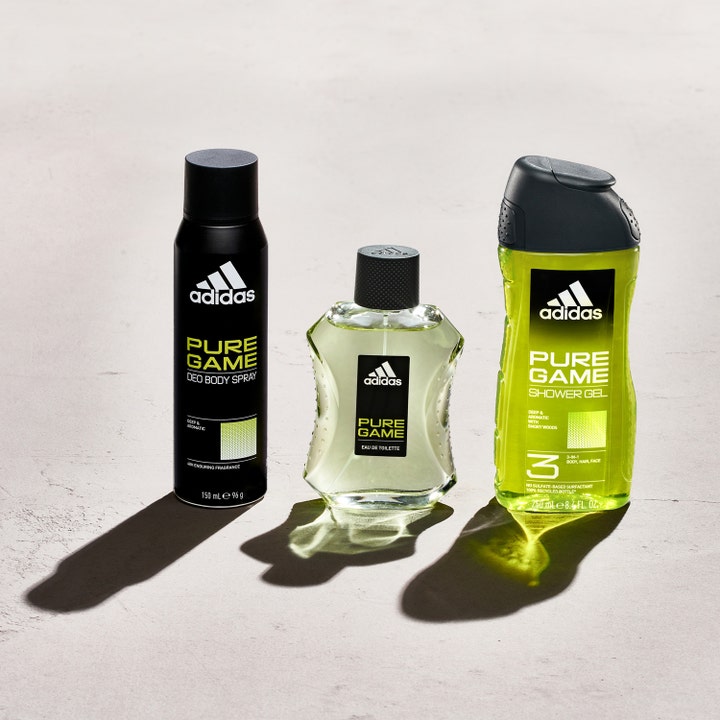 Adidas Pure Game For Him 100 ml frisk aftershave og kropsplejesæt stående på en lys overflade med skygger