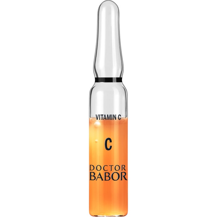 Doctor Babor Vitamin C ampul skaber glød i en gennemsigtig glasampul fyldt med orange serum.
