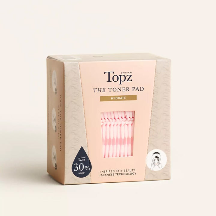 Topz Premium The Toner Pad 50 stk fugtgivende hudpleje i lyserød æske med vindue til de vaflede pads.
