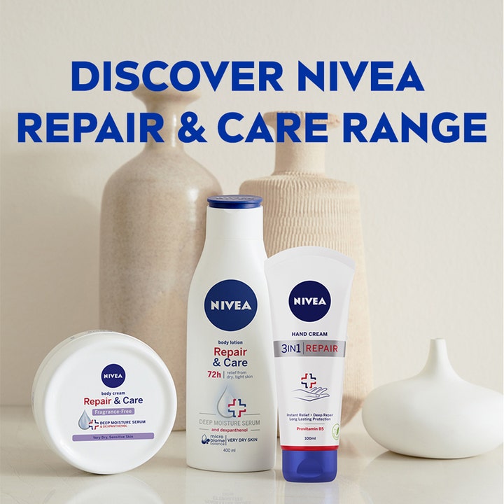 NIVEA Repair & Care 250 ml hudplejeserie der lindrer tør hud vist med hvide flasker og krukker foran vaser