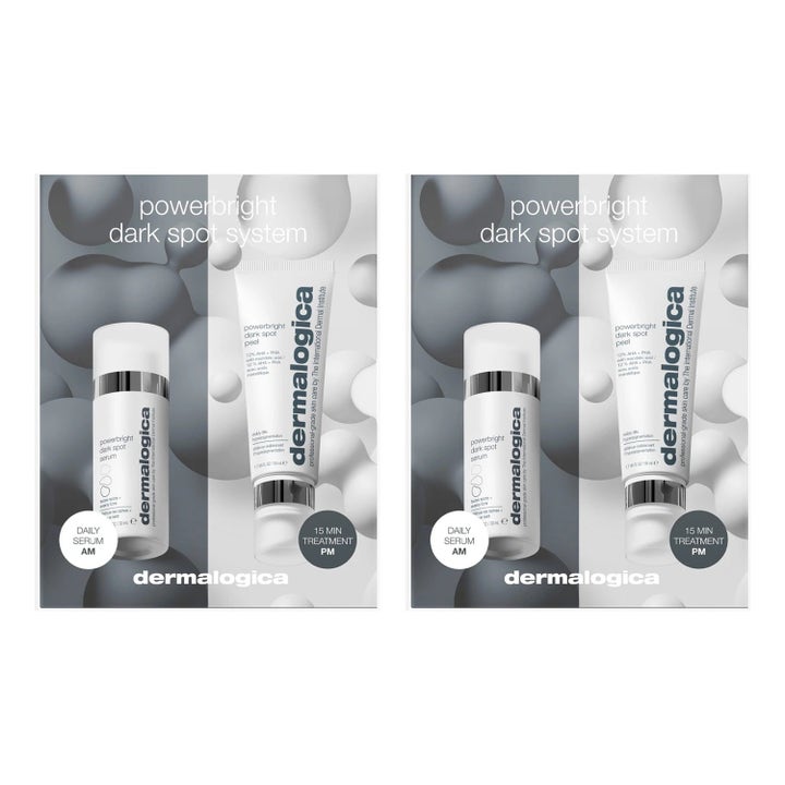 Dermalogica Powerbright Dark Spot System sæt mod pigmentpletter med hvid serumflaske og tube i grå æske.
