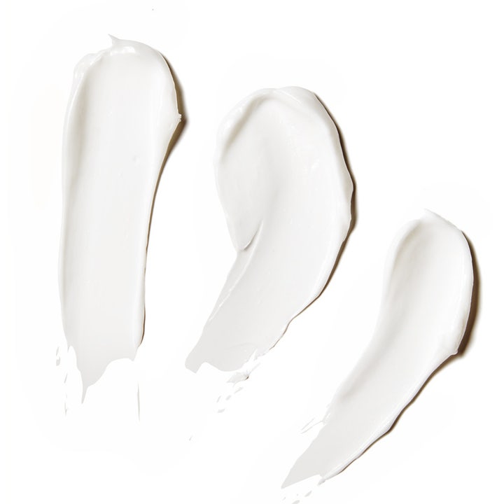 Murad Essential-C Firming Radiance Day Cream 50 ml opstrammende dagcreme med hvid cremet tekstur i tre bløde strøg