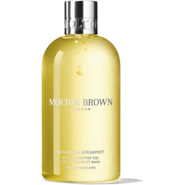 Molton Brown Orange & Bergamot Bath & Shower Gel 300 ml opfriskende kropsvask med gul væske i klar flaske med sølvlåg