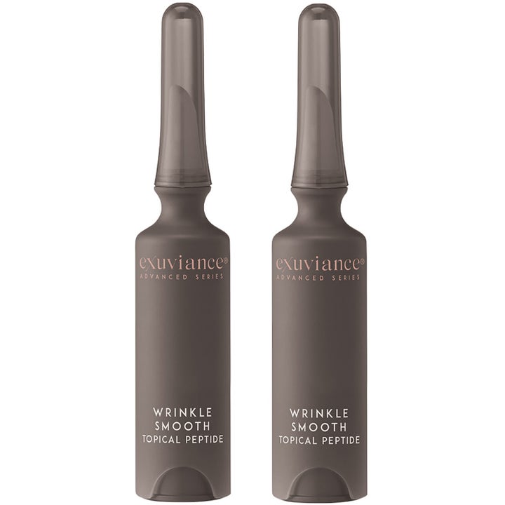 Exuviance Wrinkle Smooth Topical Peptide anti-age serum i to matte grå ampuller der reducerer rynker med peptider.