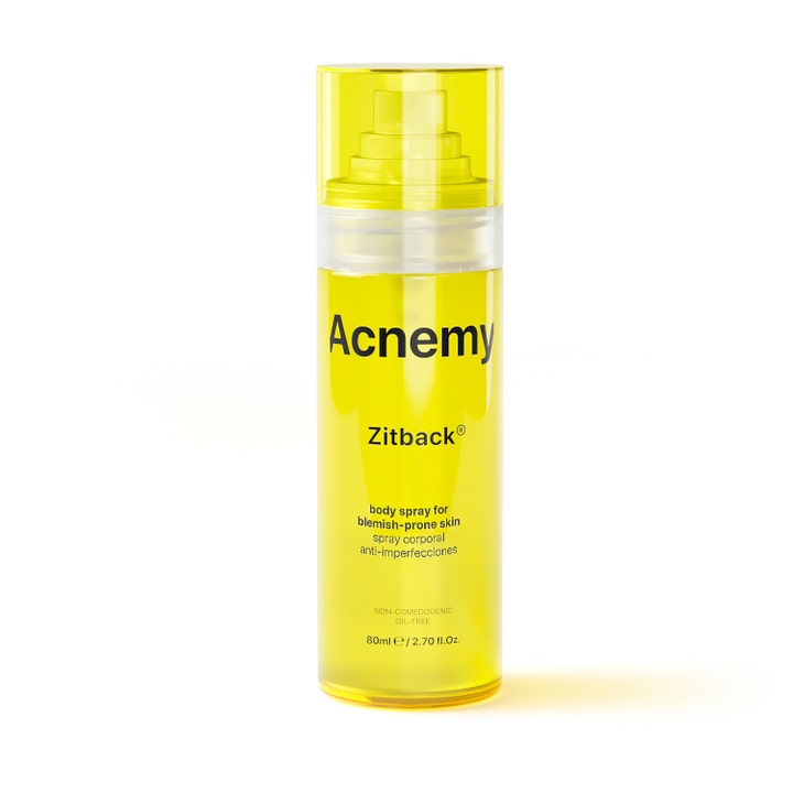 Acnemy Zitback 80 ml kropsspray mod uren hud i en gennemsigtig gul flaske med praktisk spraypumpe