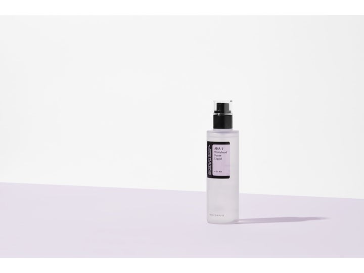 COSRX AHA 7 Whitehead Power Liquid 100 ml eksfolierende toner mod urenheder i frostet flaske med sort pumpe