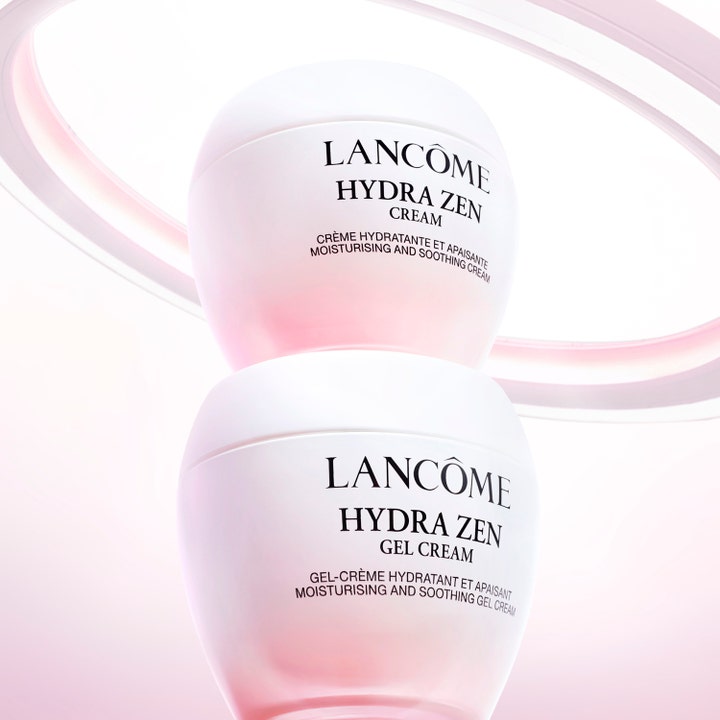 Lancôme Hydra Zen 50 ml fugtgivende dagcreme og gel i hvide krukker med lyserød gradient stablet på lys baggrund