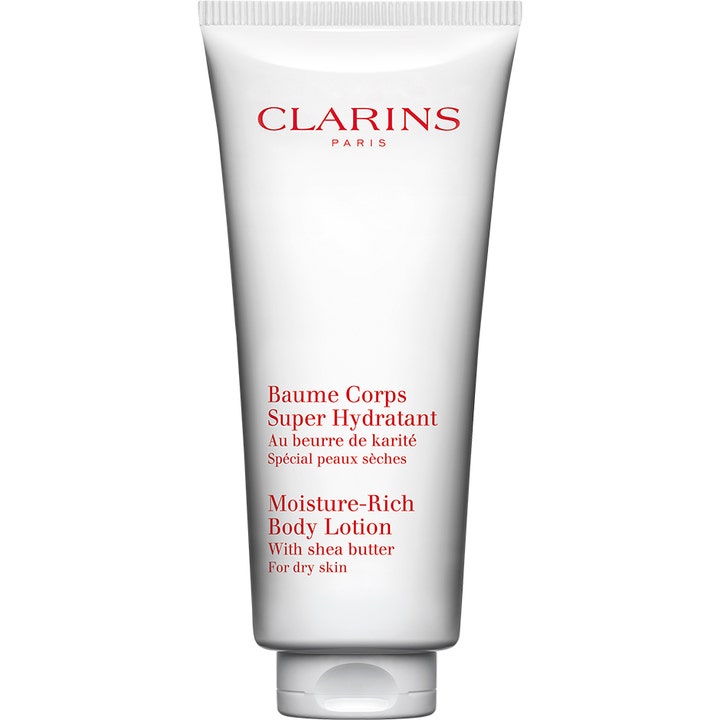 Clarins Moisture-Rich Body Lotion fugtgivende kropspleje med sheasmør i en hvid tube med rød og sort tekst