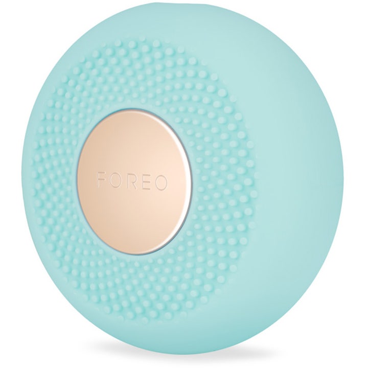 FOREO UFO mini 2 Mint hudplejeenhed til ansigtsbehandling i mintgrøn silikone med elegant plade i rosaguld