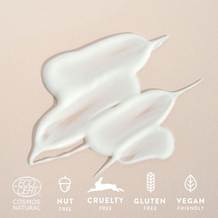 MÁDARA Hydra Soft Body Lotion 250 ml cremet hvid tekstur med EcoCert Nut Cruelty Gluten Free og Vegan ikoner