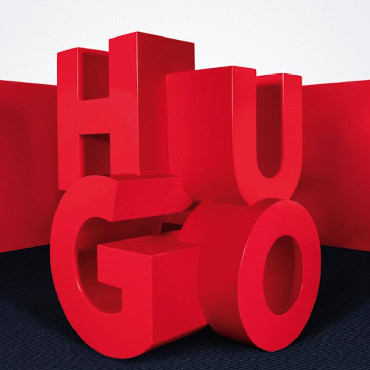 Hugo Boss Hugo Hugo Green Deostick 75 ml deostick til mænd viser store røde 3D-bogstaver med navnet HUGO