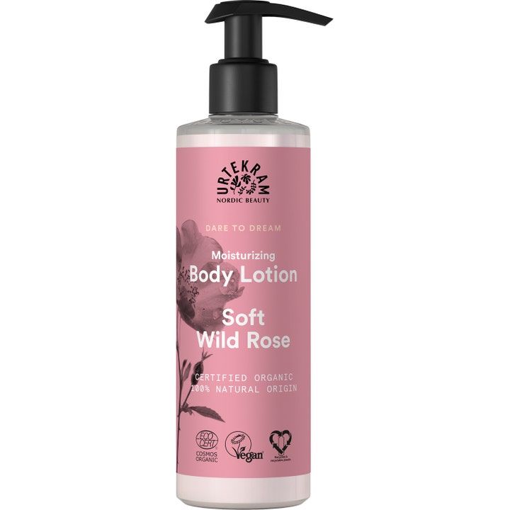 Urtekram Soft Wild Rose Body Lotion fugtgivende kropspleje i gennemsigtig flaske med lyserød etiket og sort pumpe