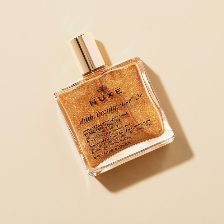 Nuxe Huile Prodigieuse Or 100 ml glitrende kropsolie i glasflaske med guldskimmer der giver huden glød
