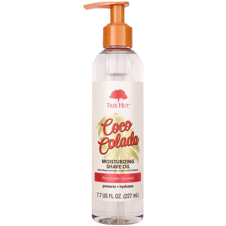 Tree Hut Coco Colada 227 ml fugtgivende barberolie i gennemsigtig flaske med orange pumpe og tropisk etiket