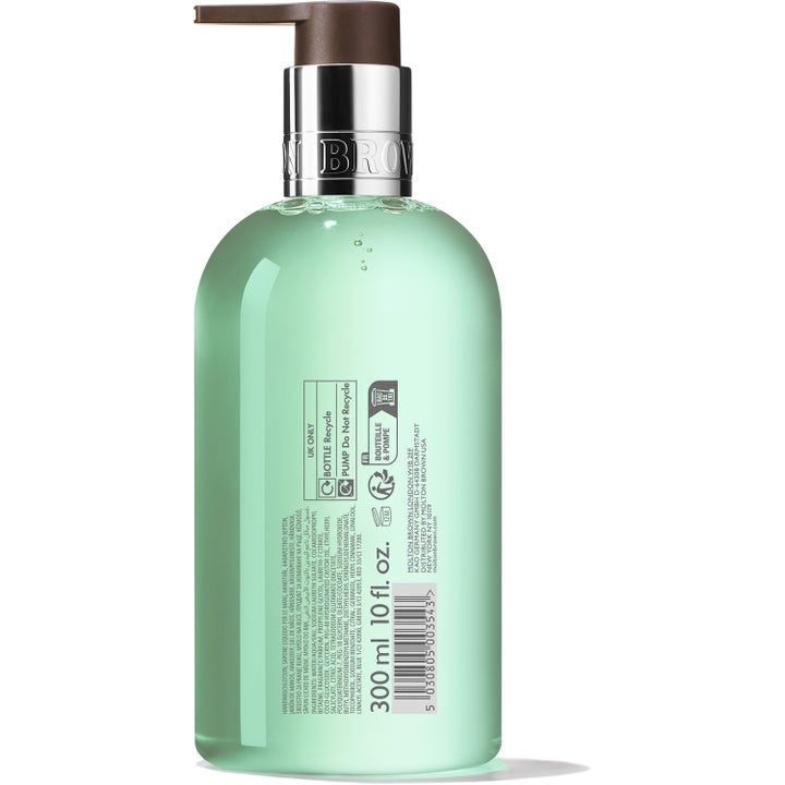 Molton Brown Refined White Mulberry 300 ml håndsæbe i klar flaske med lysegrøn gel og sølvfarvet pumpe set bagfra.