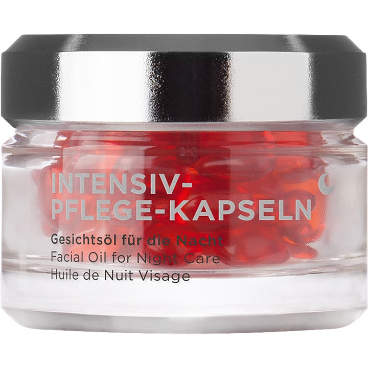 Intensiv-Pflege-Kapseln Facial Oil for Night Care i glas krukke med røde kapsler og sølvlåg