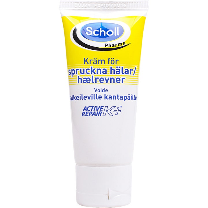 Scholl Pharma Creme til hælrevner reparerende fodcreme i en hvid og gul plasttube med Active Repair K+ logo