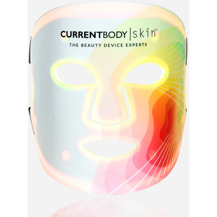 Currentbody Skin LED 4-in-1 Mask til lysbehandling hvid ansigtsmaske med farverigt grafisk mønster