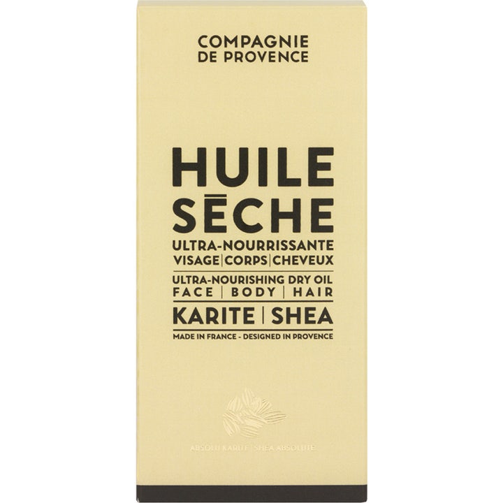 Compagnie de Provence Ultra Nourishing Dry Oil Shea Butter 100 ml nærende tørolie i beige papemballage med sort tekst