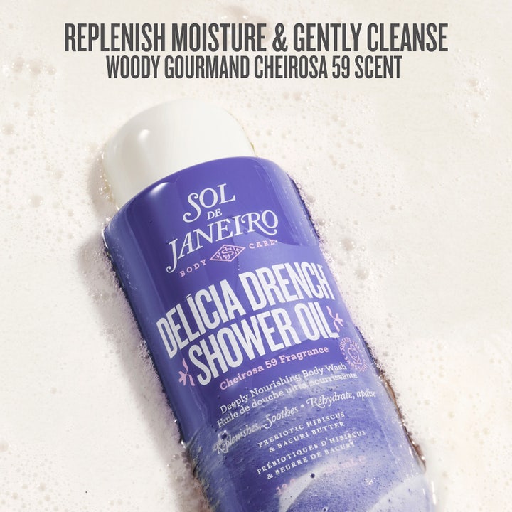Sol de Janeiro Delicia Drench Shower Oil 385 ml nærende badeolie i lilla flaske med gylden olie og hvidt skum