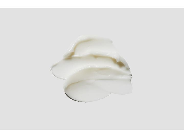 COSRX Balancium Comfort Ceramide Cream 80 ml fugtgivende ansigtscreme med en rig og hvid cremet tekstur.