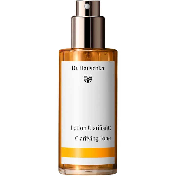 Dr. Hauschka Clarifying Toner 100 ml balancerende ansigtsvand i ravgul glasflaske med spraypumpe i sølv.