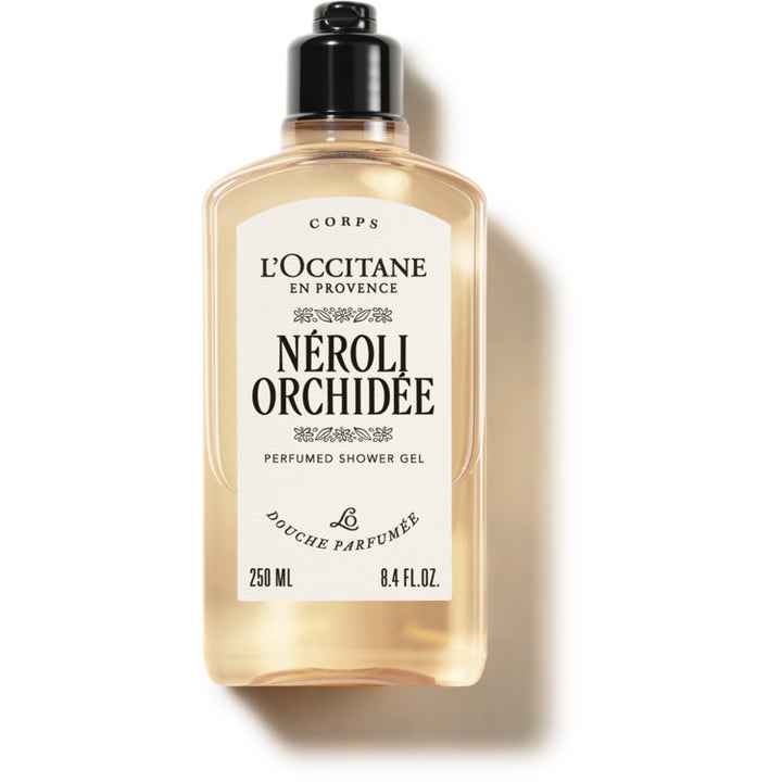 L'Occitane Néroli & Orchidée 250 ml velduftende showergel i gennemsigtig flaske med gylden gel og sort pumpe