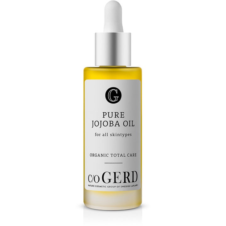 C/O GERD Pure Jojoba Oil plejende ansigtsolie i glasflaske med gul olie og sølvfarvet pipette