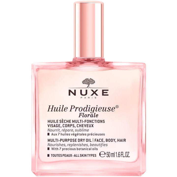 Nuxe Huile Prodigieuse Florale 50 ml nærende tørolie giver glød i en firkantet glasflaske med rosa guld metallåg