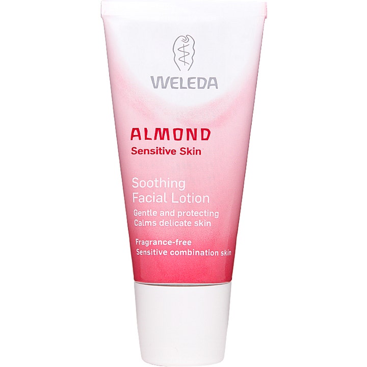 Weleda Almond Soothing Facial Lotion 30 ml beroligende ansigtslotion i en lyserød og hvid tube med hvidt skruelåg.