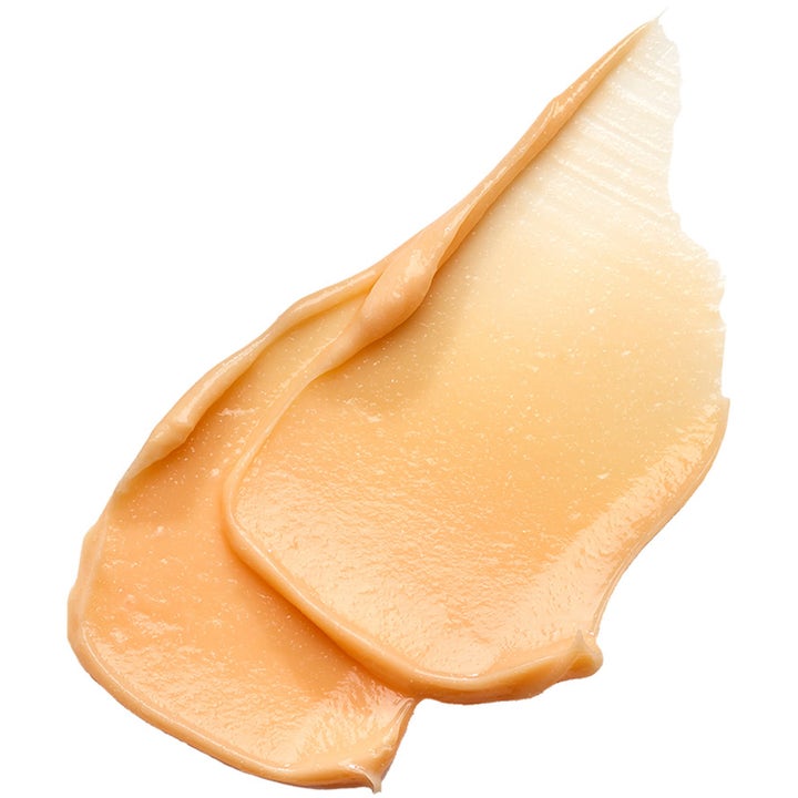 Exuviance Triple Microdermabrasion Face Polish 75 g peeling med en cremet orange kornstruktur der giver glød