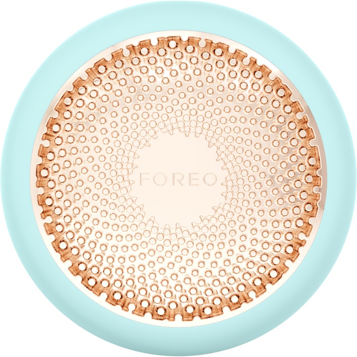 FOREO UFO 2 1 stk ansigtsbehandling der giver fugt i mintgrøn silikone med en rund rosaguld metalplade