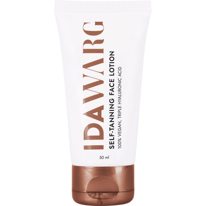 Ida Warg Self-Tanning Face Lotion 50 ml fugtgivende selvbruner i hvid tube med bronzefarvet låg og tekst