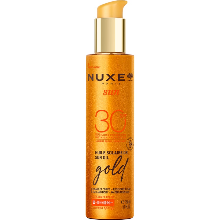 Nuxe Sun Oil Gold SPF 30 150 ml sololie der giver glød i en glimtende orange flaske med gylden pumpe