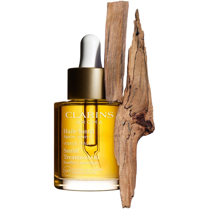 Clarins Santal Face Treatment Oil 30 ml beroligende ansigtsolie i glasflaske med sandeltræ