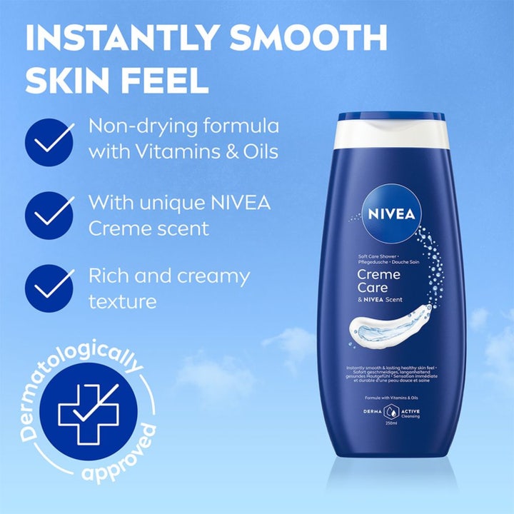 NIVEA Creme Care Shower 250 ml plejende bodysæbe i en mørkeblå flaske med hvidt cremesplash og vitamins & oils logo