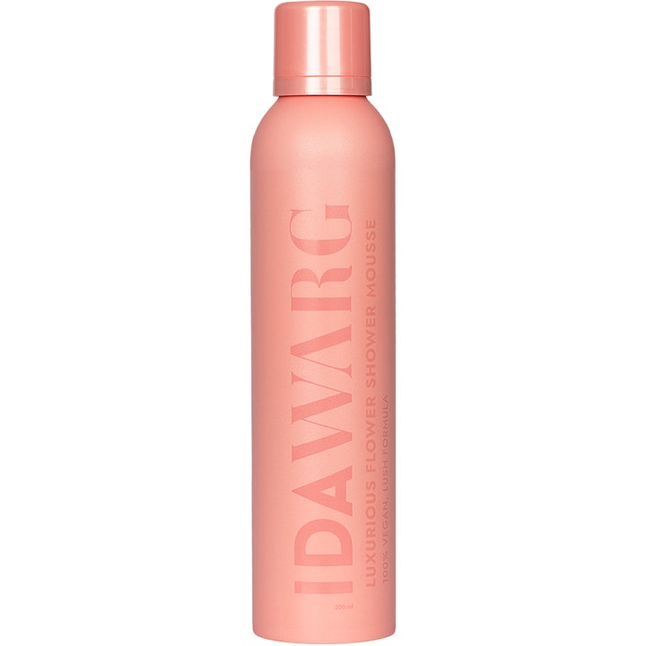 Ida Warg Luxurious Flower Shower Mousse 200 ml i en ferskenfarvet sprayflaske som giver huden fugt.