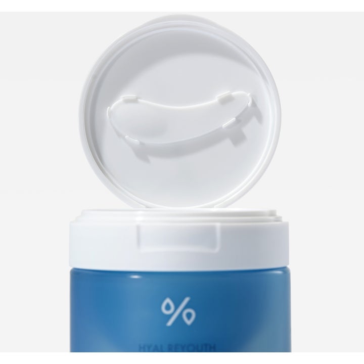 Dr. Ceuracle Hyal Reyouth Melting Foaming Balm 100 ml fugtgivende ansigtsrens i blå krukke med spatel i låget.