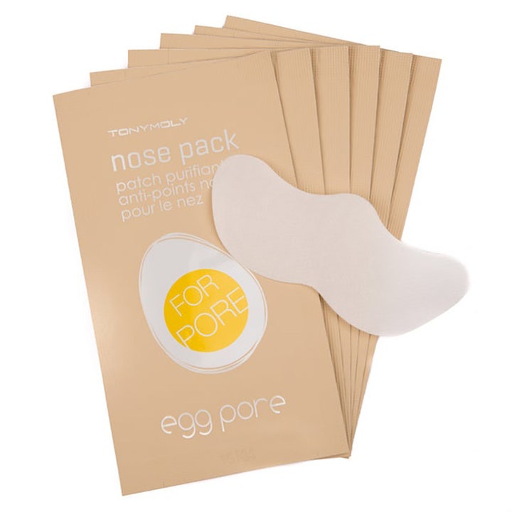 Tonymoly Egg Pore Nose Pack 7 stk næsemaske mod hudorme med beige breve og en hvid strip.