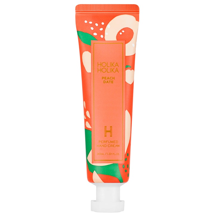 Holika Holika Peach Date Perfumed Hand Cream 30 ml blødgørende håndcreme i orange tube med ferskenmotiver og hvidt låg.