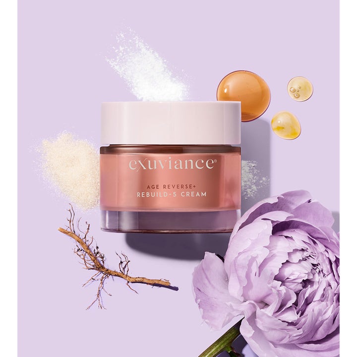 Exuviance Age Reverse + Rebuild-5 Cream 50 ml opstrammende dagcreme i roseguld krukke med hvidt låg og lilla blomst