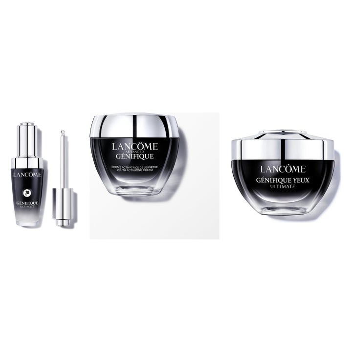 Lancôme Génifique Ultimate hudplejesæt mod rynker i elegante sorte glaskrukker og serumflaske med sølvlåg.