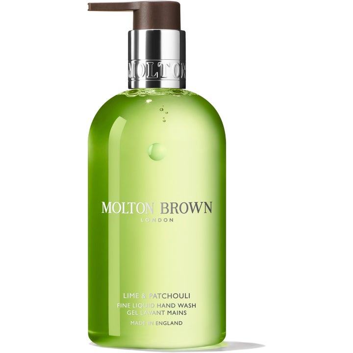 Molton Brown Lime & Patchouli Fine Liquid Hand Wash 300 ml flydende håndsæbe i klar flaske med grøn sæbe og sølvpumpe.