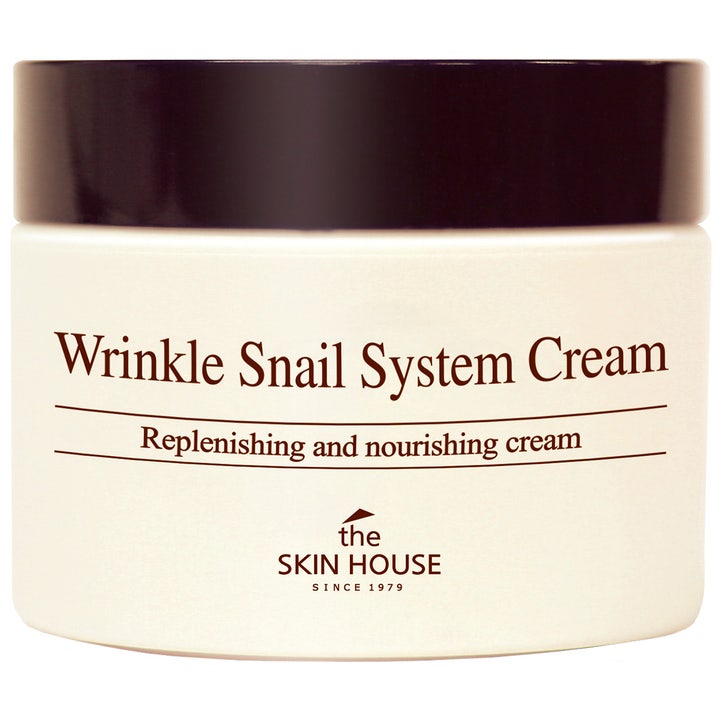 The Skin House Wrinkle Snail System Cream nærende ansigtscreme med snegleslim i hvid krukke med mørkebrunt låg.
