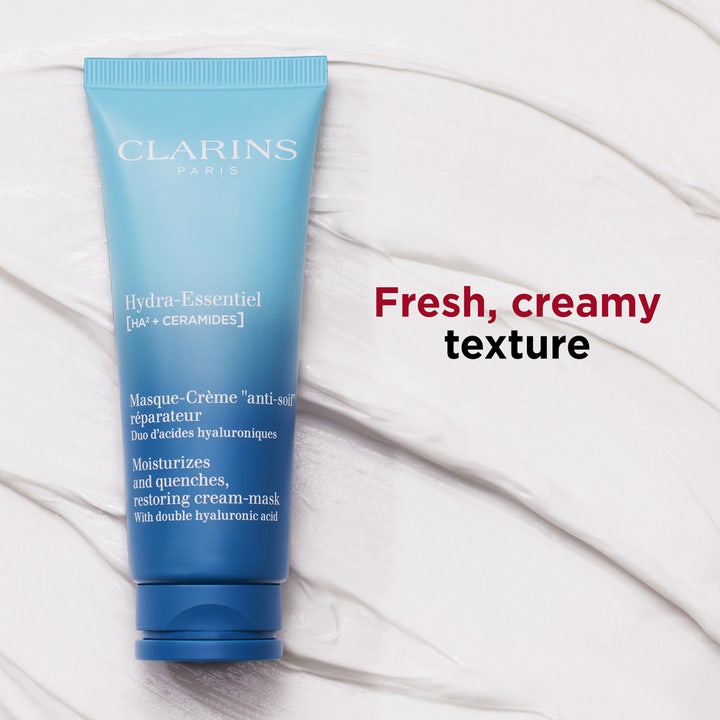 Clarins Hydra-Essentiel 75 ml ansigtsmaske i blå tube på en frisk cremet hvid konsistens.