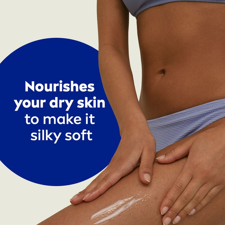 NIVEA Rich Nourishing Body Lotion 250 ml plejer tør hud og gør den silkeblød som vist på en kvindes ben