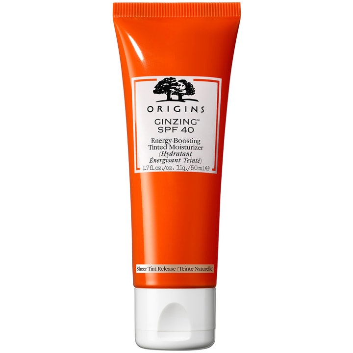 Origins GinZing SPF 40 Tinted Moisturizer 50 ml fugtgivende dagcreme i en klar orange tube med hvidt låg
