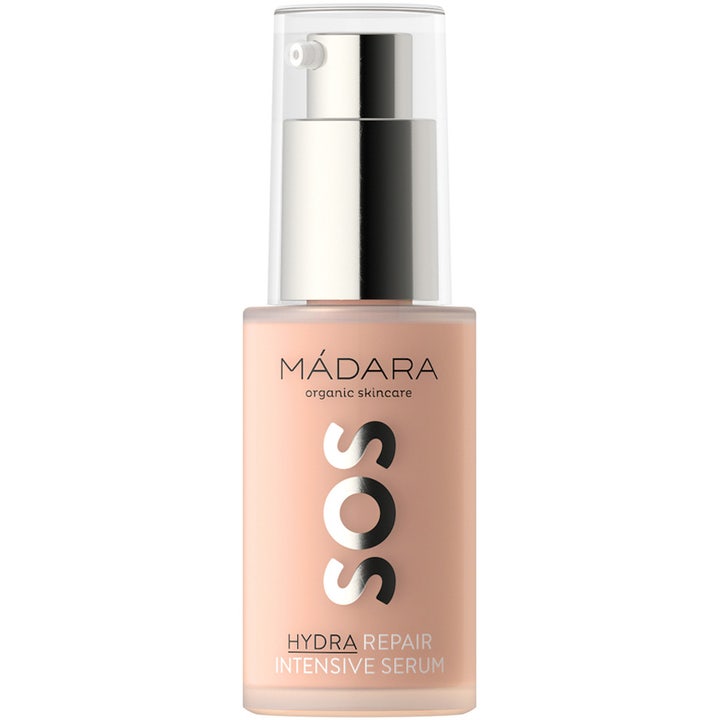 Mádara SOS Hydra Repair Intensive Serum 30 ml fugtgivende serum i klar flaske med ferskenfarvet indhold og sølvpumpe